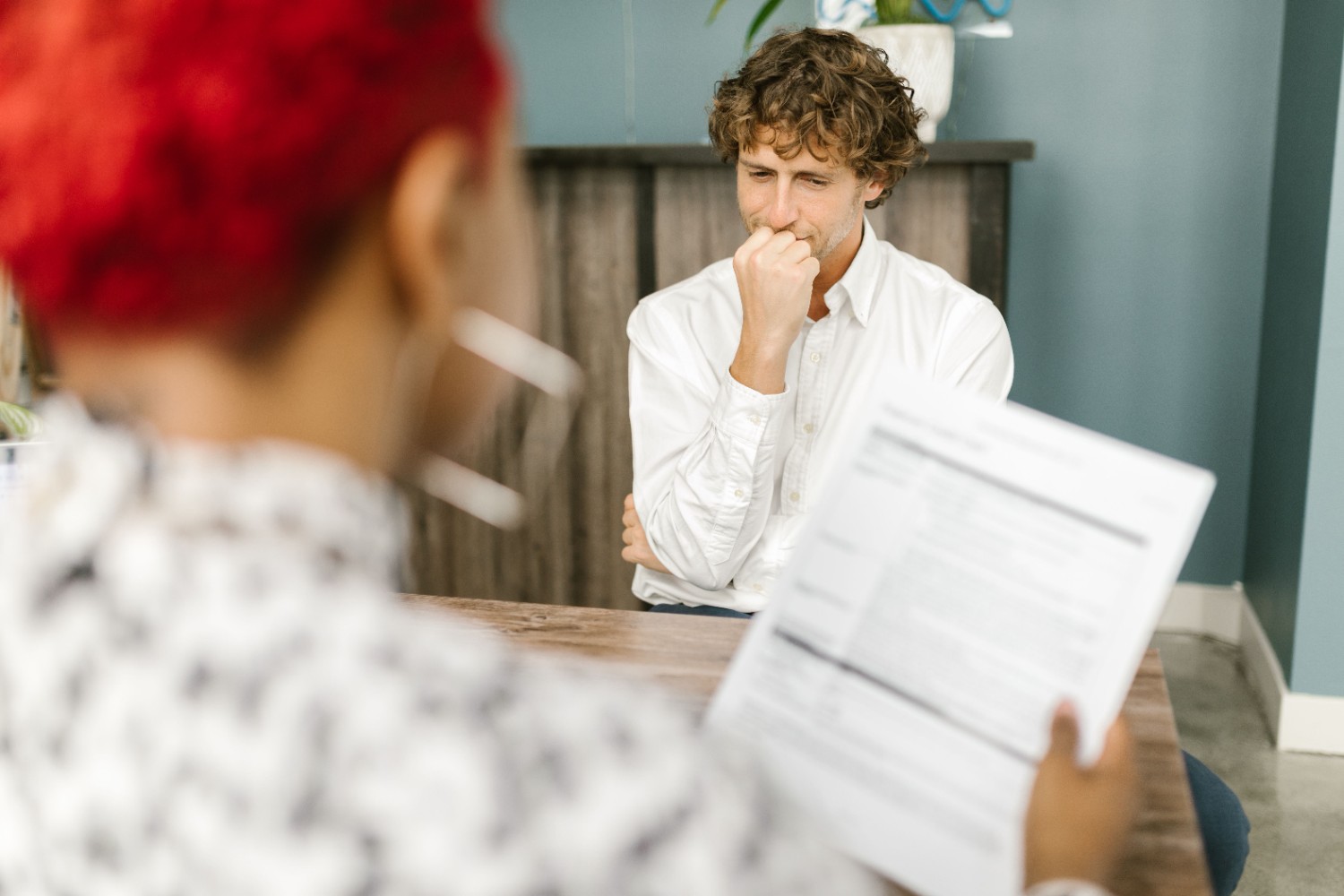 HR manager interviewing candidate at desk