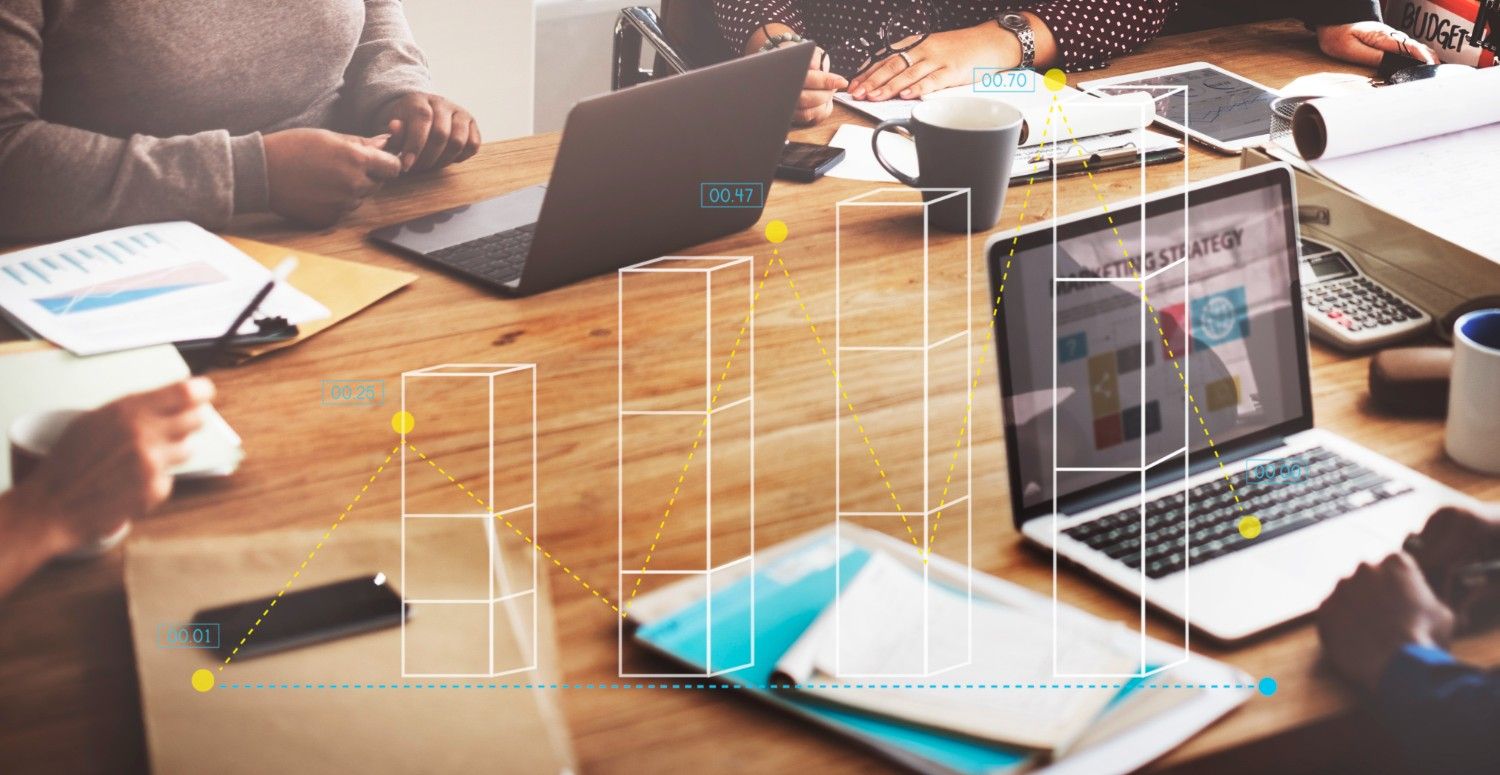 Digital bar graph overlay business meeting