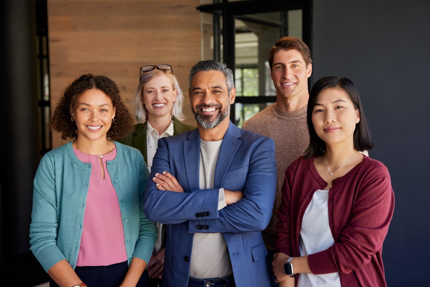 Confident multicultural company leadership group portrait