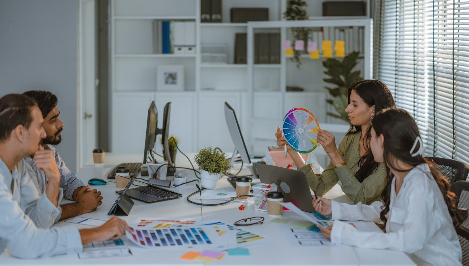 Business professionals in a product development meeting