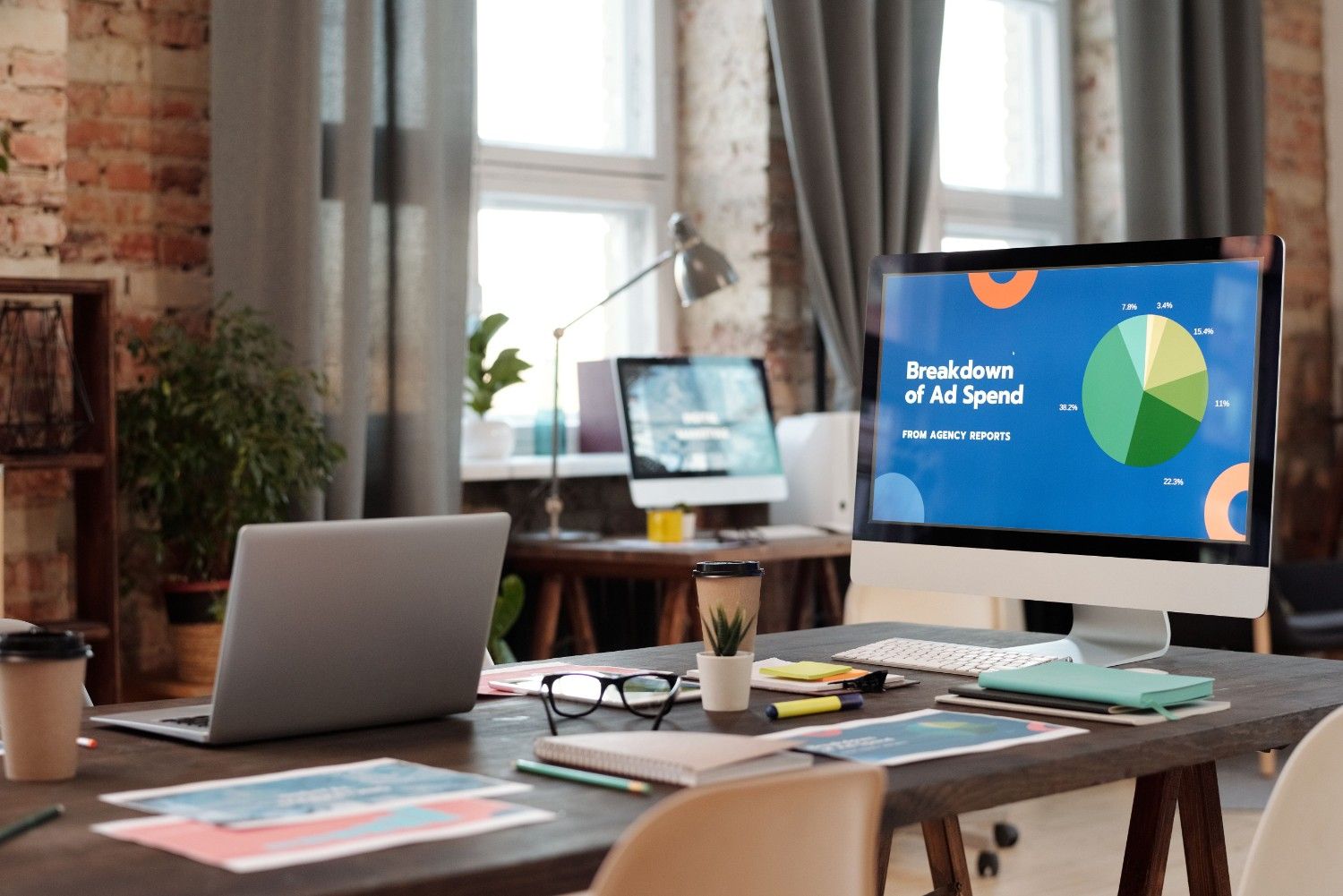 Ad spend breakdown analytics desktop monitor