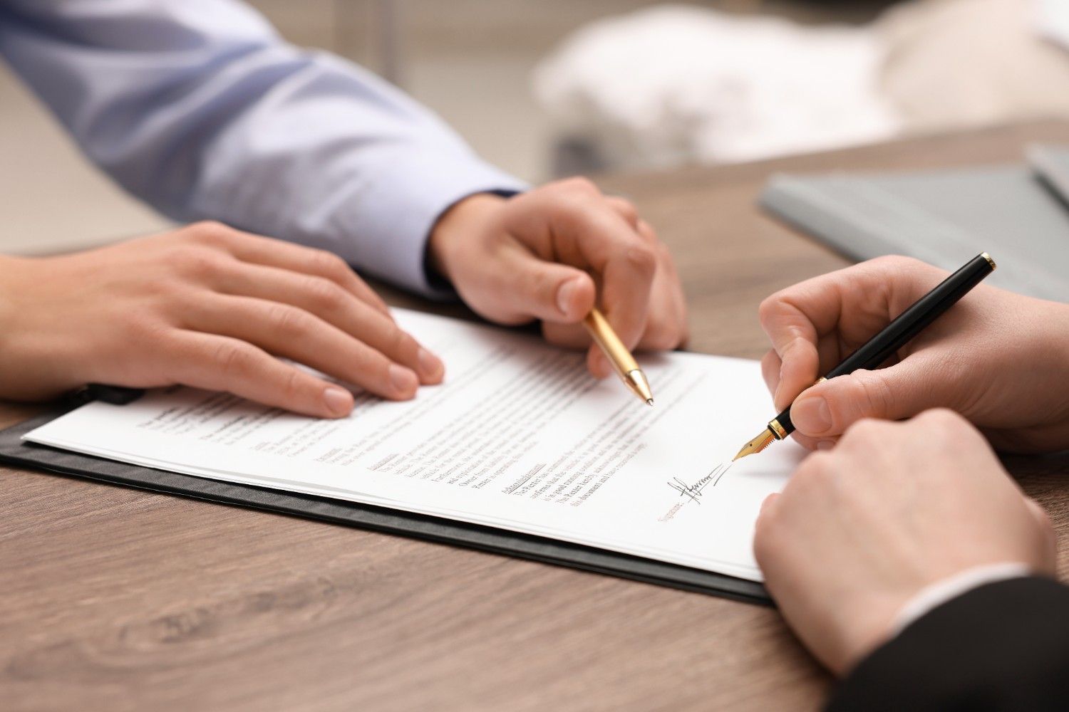Contract signing business contract gold pen