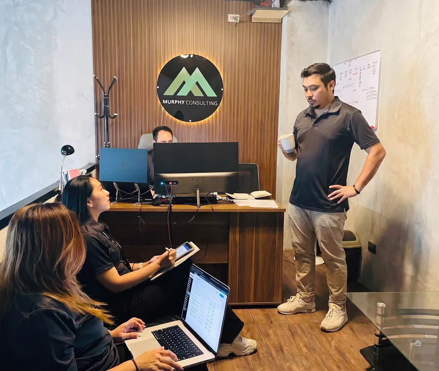 Murphy AI lead walking the team through an automation demo in the studio
