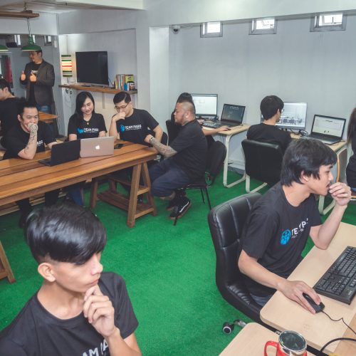Production team members collaborating during a workshop